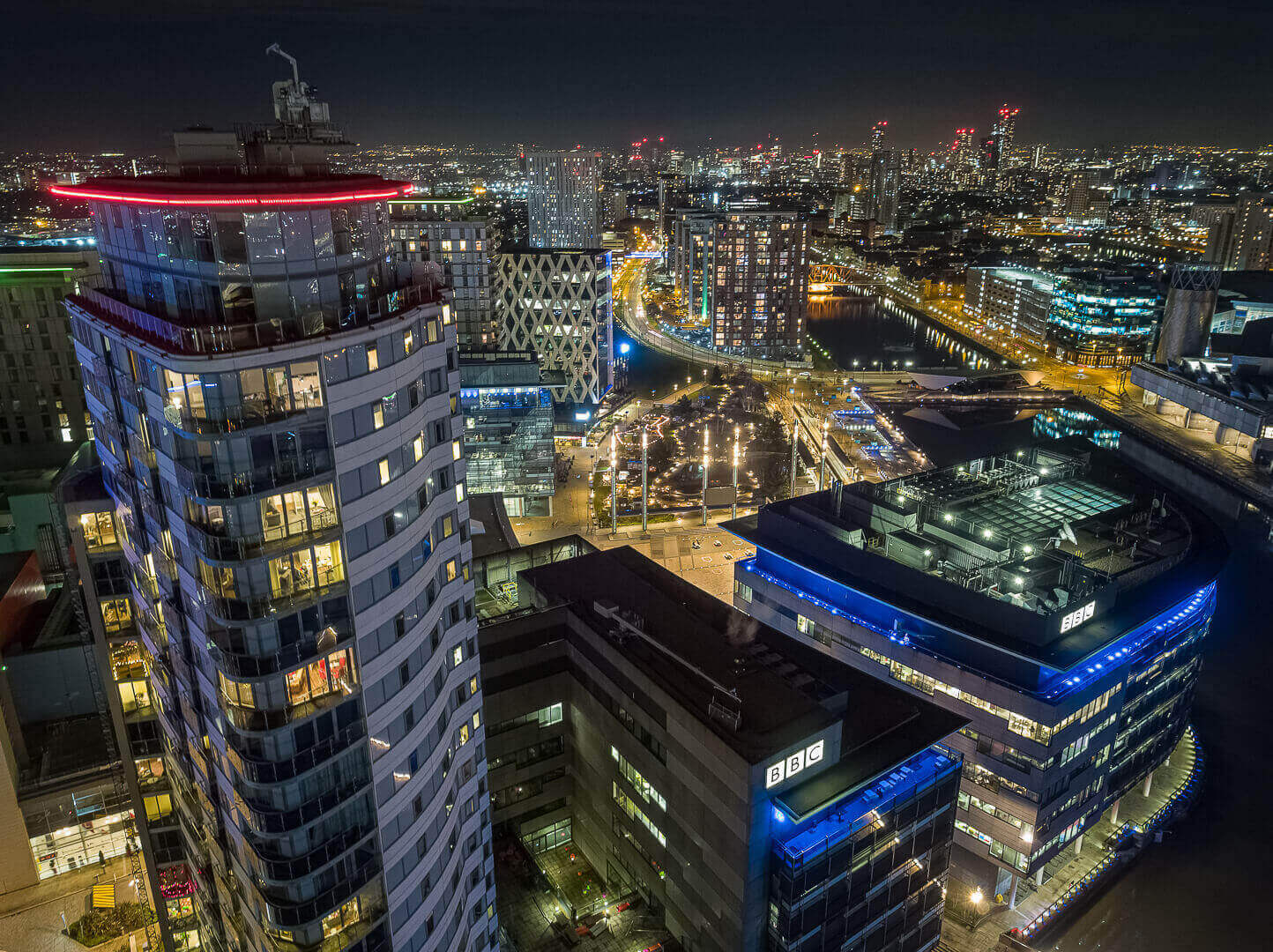 Aerial drone photography of MediaCityUK at night for Peel Group - Midi Photography