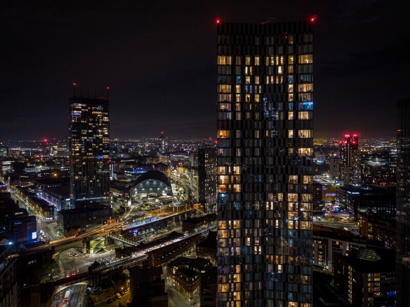Aerial drone photography of Manchester at night including Deansgate Square, Beetham Tower & Manchester Central