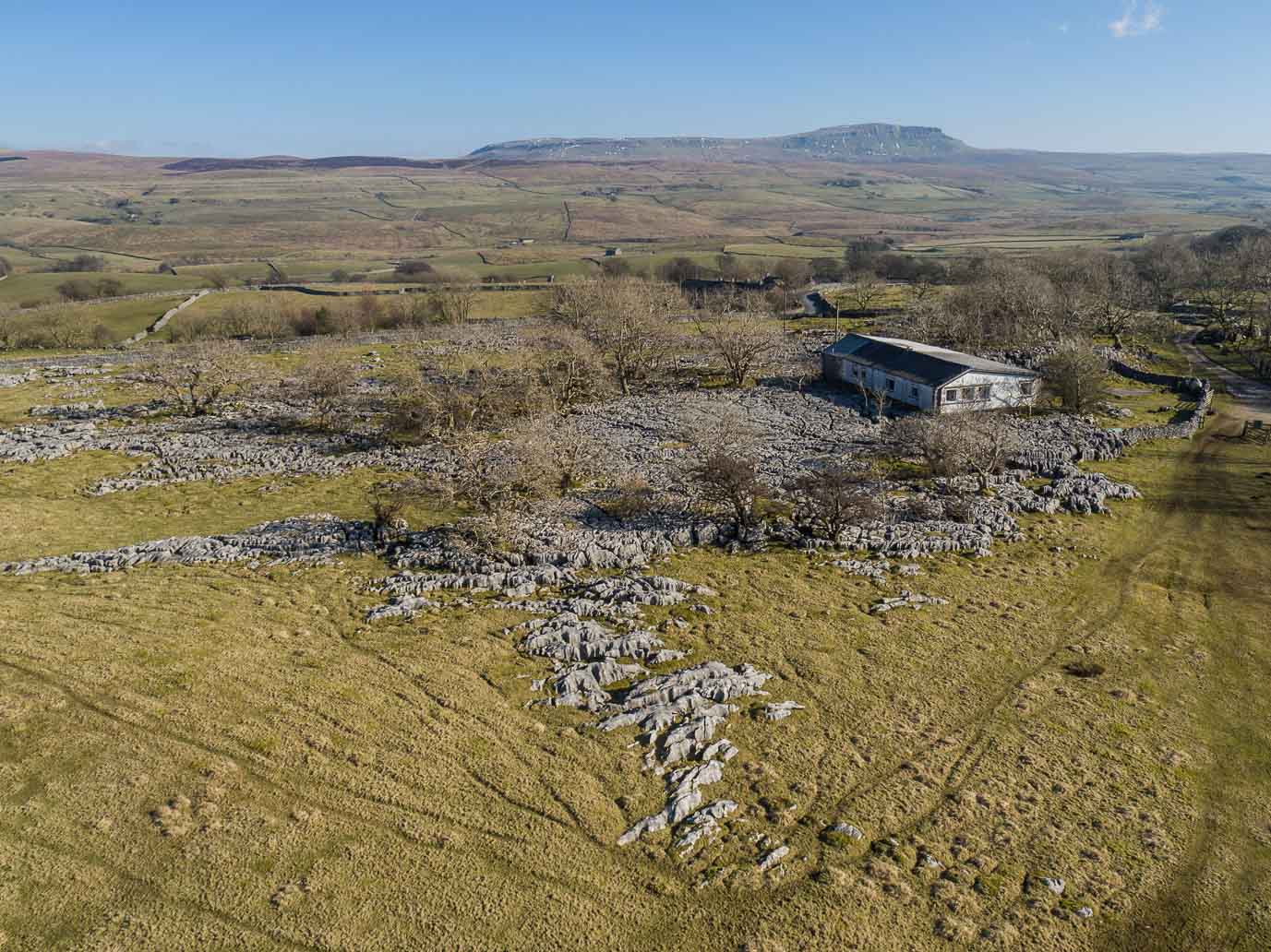 Aerial photography - The University of Leeds' Selside Outdoor Centre overlooking Pen-y-ghent, North Yorkshire - Midi Photography