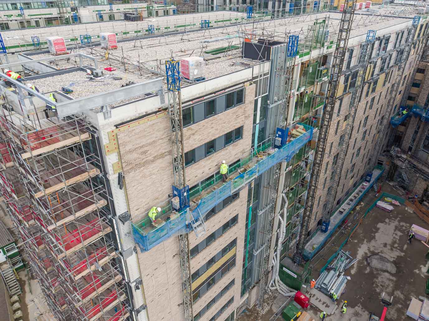 Aerial drone photography of works progress at Clippers Quay construction development, Salford