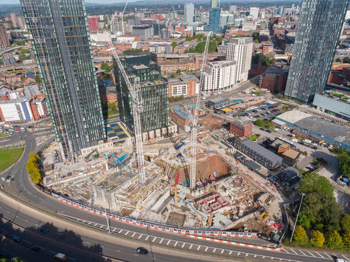 Aerial drone photography of The Blade and Three60 residential development construction progress in Manchester