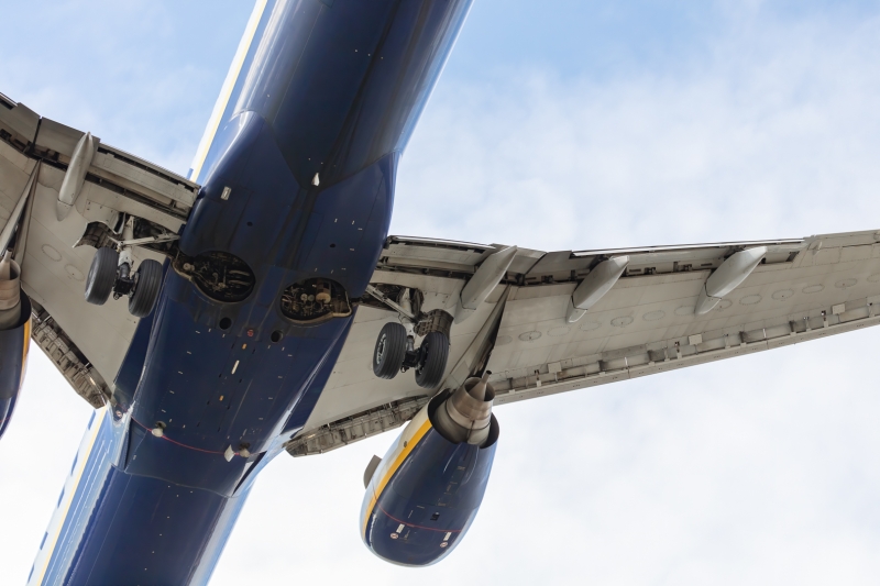 Aviation aircraft photography of A Ryanair operated Boeing 737-8AS registration 9H-QDG showing detail of the landing gear bay, landing at Liverpool John Lennon Airport (LPL), UK