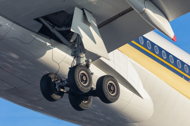 Aviation aircraft photography of the undercarriage / landing gear of an Airbus A350-941, registration 9V SMT operated by Singapore Airlines arriving at London Heathrow (LHR), UK