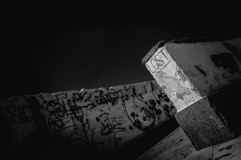 Black & white image of a graffiti covered wall in Civitavecchia, Italy. The word ‘Lost’ makes the image and was the reason for taking the photograph